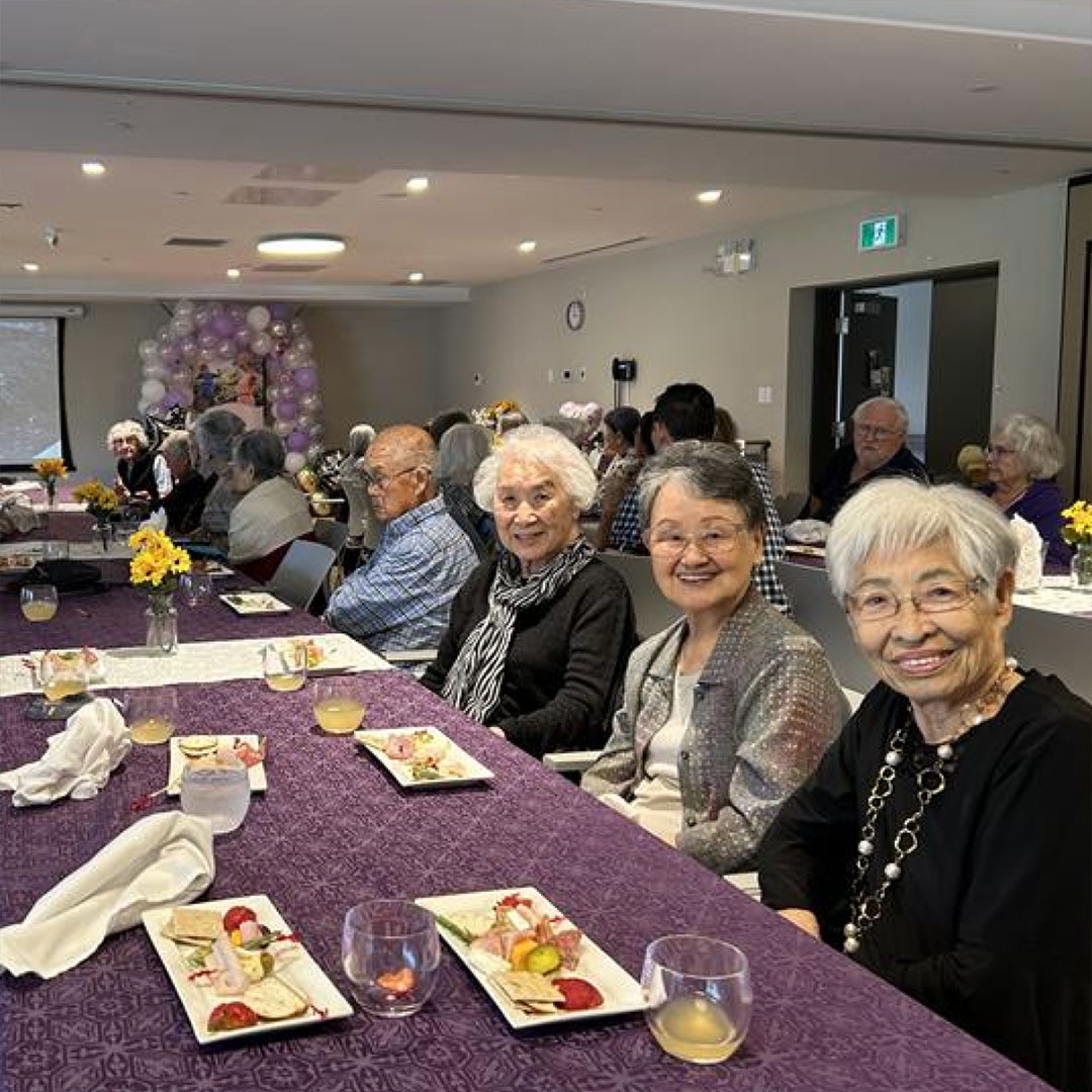 Seniors sitting together in Wisteria Place